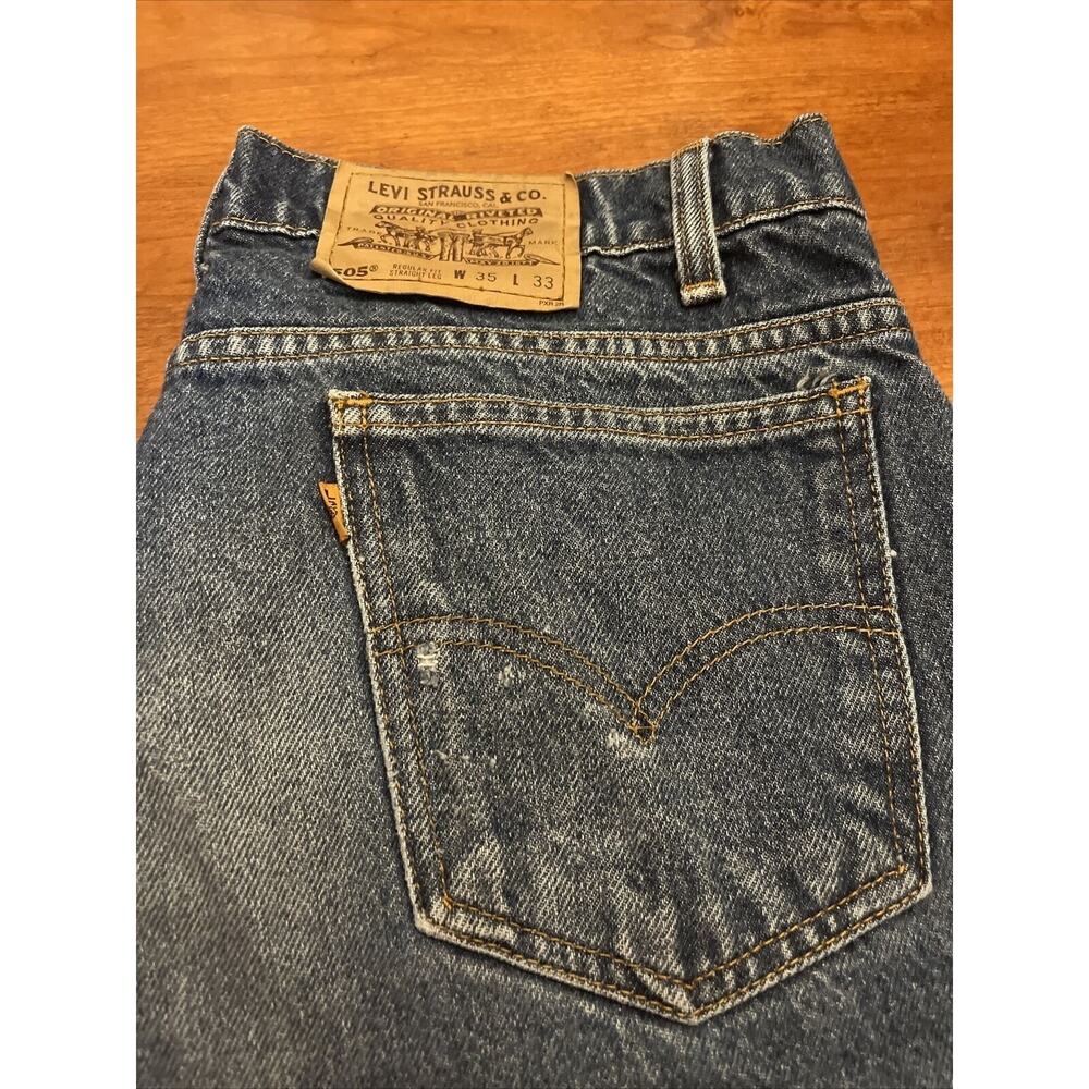 Vintage Levis 505 Size 35x33 Made in USA Light Blue Orange Tab Faded Denim Jeans